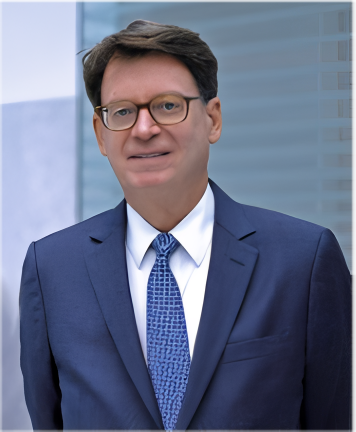 Jim Duff, wearing a navy blue suit and light blue tie for a portrait, is named the interim dean of the J. David Rosenberg College of Law at UK.