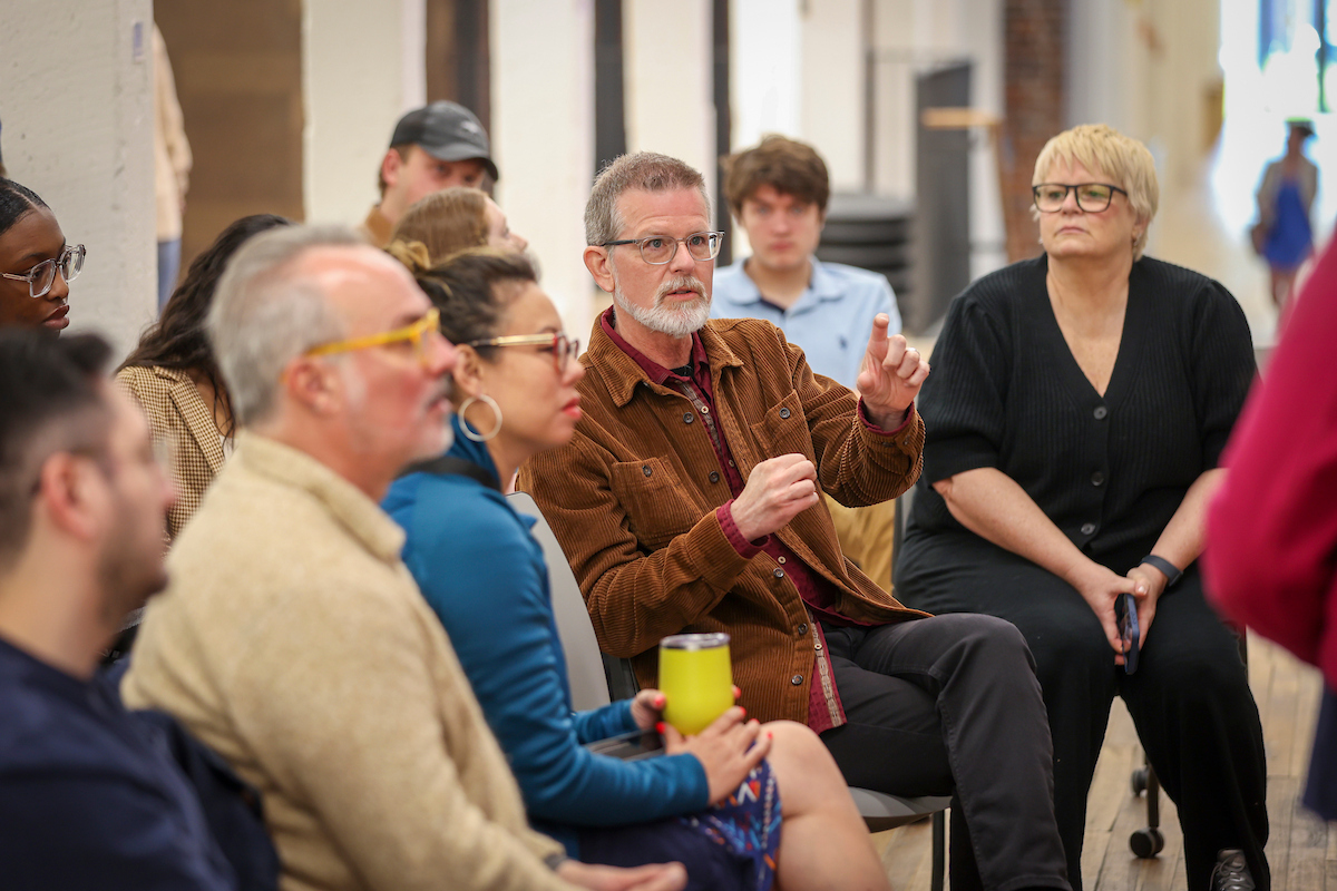 College of Design faculty sit at a final design critique.