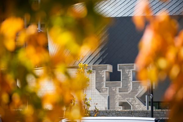 The UK logo in stone outside the Gatton Student Center.