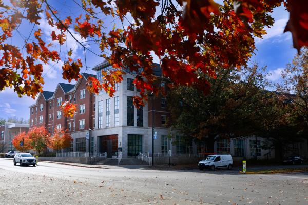 Outside of Lewis Honors College in the fall season. 