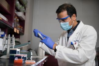 Photo of researcher in a lab