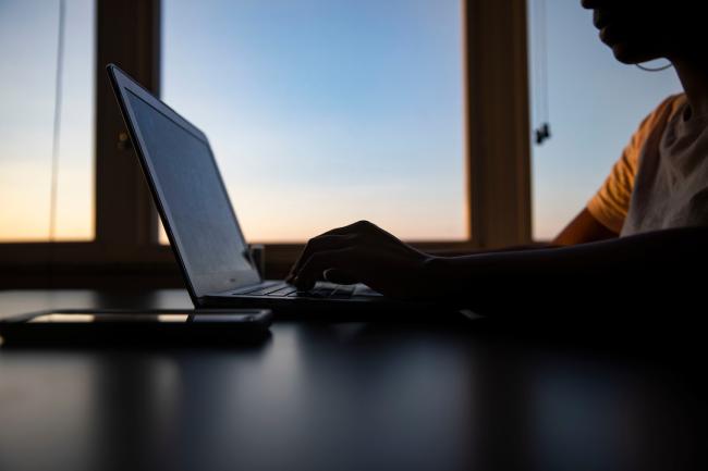 Student working on laptop