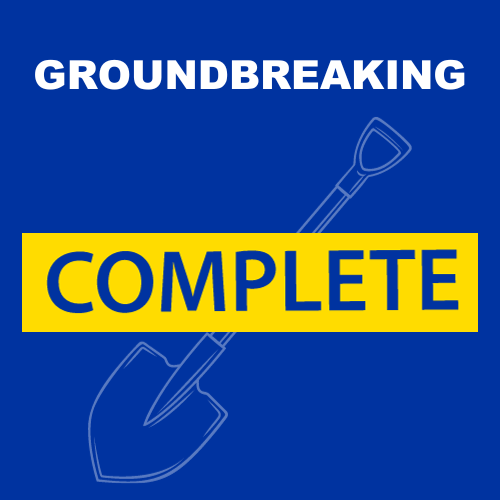 Blue graphic with cartoon shovel. Title reading, "Groundbreaking, October 2023" in white. Large yellow stamp reading, "Complete" on top of cartoon shovel. 