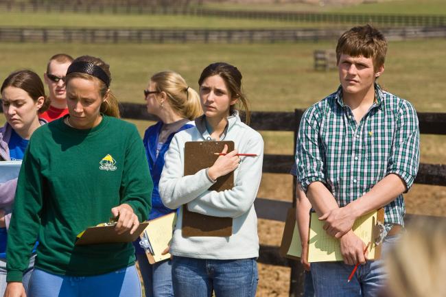 Students on a farm at the UK College of Agriculture, Food and Environment.