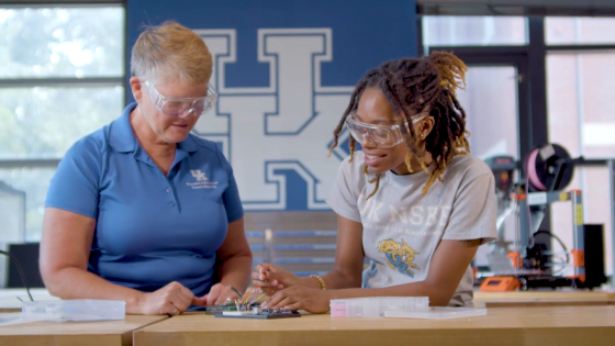 This is a photo of a faculty and student mentorship at UK.