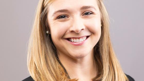 Meredith Weber head shot wearing a black top and black blazer