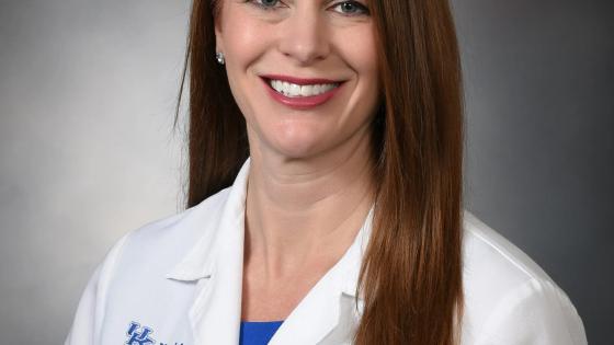 Headshot of Candice Falls in a medical white coat.