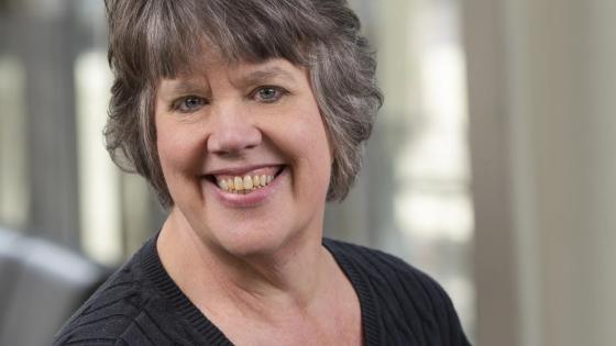 Headshot of Trish Freeman in a black shirt.