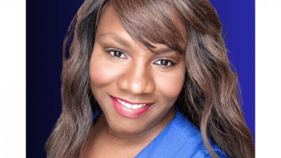 Headshot of Sherelle Roberts in a blue shirt.