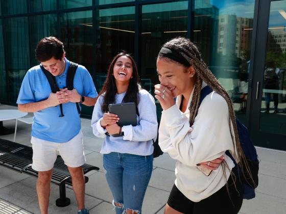 Photo of students laughing together
