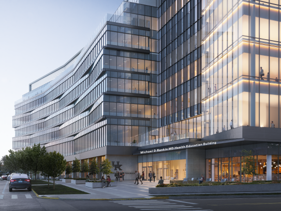 rendering of new education building with many windows. 