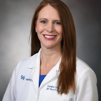 Headshot of Candice Falls in a medical white coat.