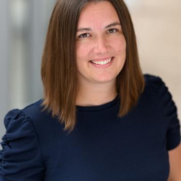 Headshot of Aubrey Jones in a black shirt.