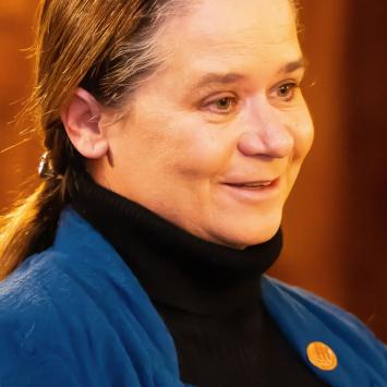 Headshot of Kathleen Montgomery in a black turtleneck.
