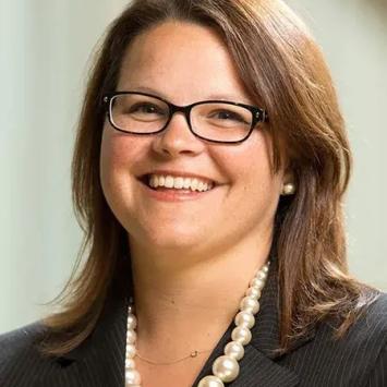 Headshot of Leslie Vincent in a black blazer.