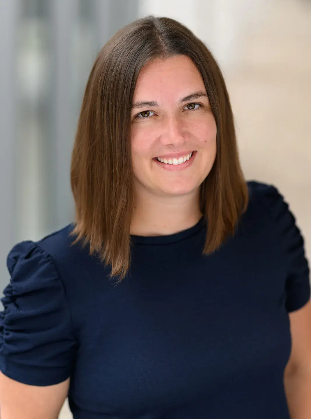 Headshot of Aubrey Jones in a black shirt.