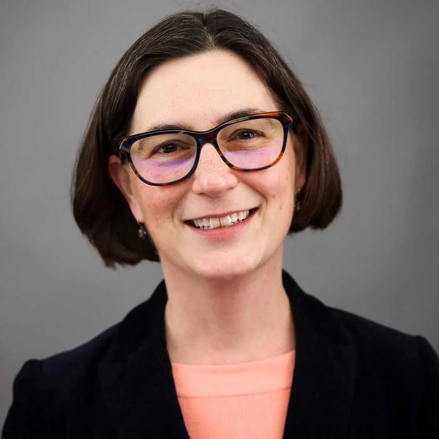 Headshot of Kirsten Metzler-Wilson in a black blazer.