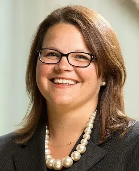 Headshot of Leslie Vincent in a black blazer.